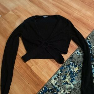 A black, ringed cross over long sleeve shirt #garage #goingout